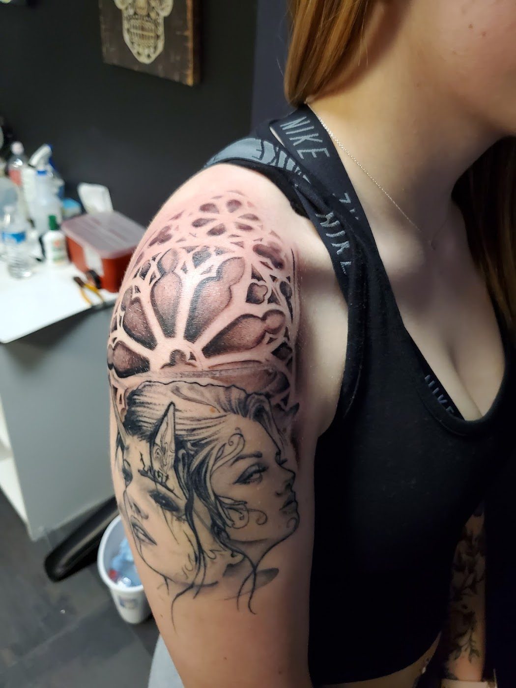 Floral shoulder tattoo by Atomic Art