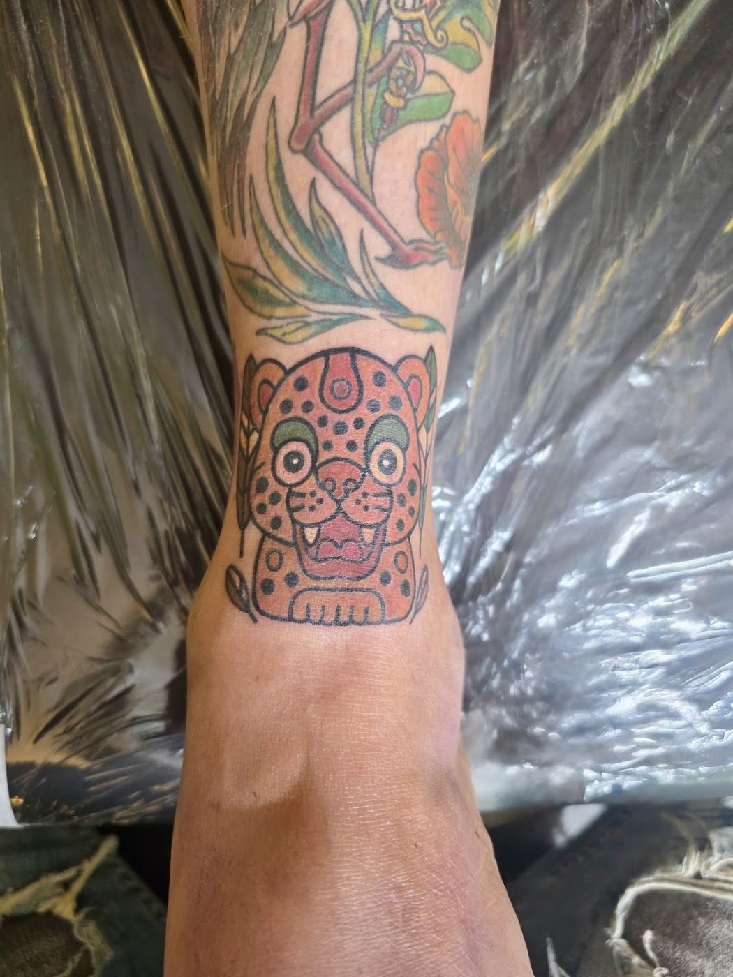Fresh ornamental color wrist tattoo